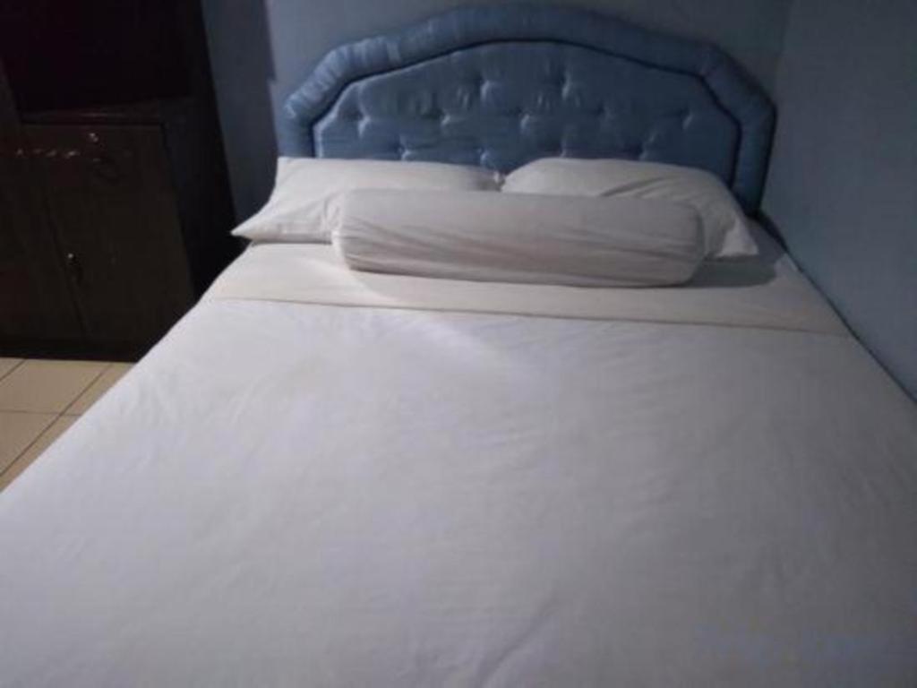 Oyo 90376 Centre Point Hotel Лимбанг Екстериор снимка