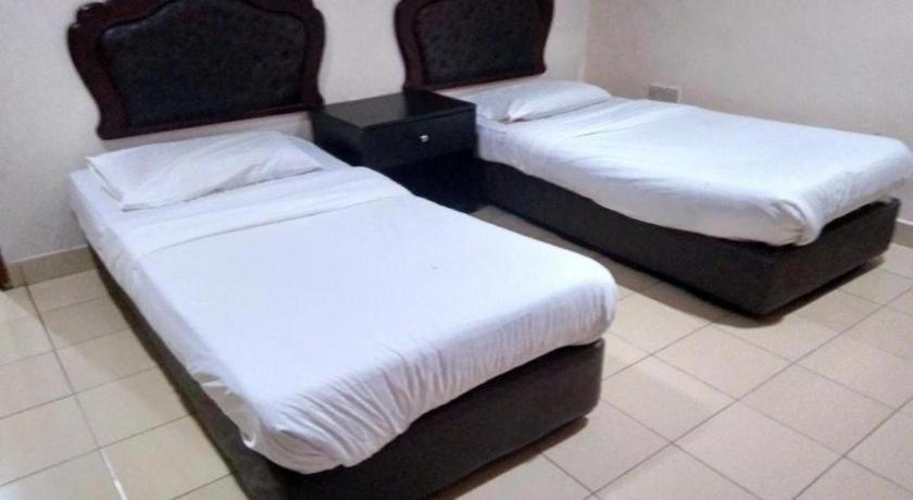 Oyo 90376 Centre Point Hotel Лимбанг Екстериор снимка